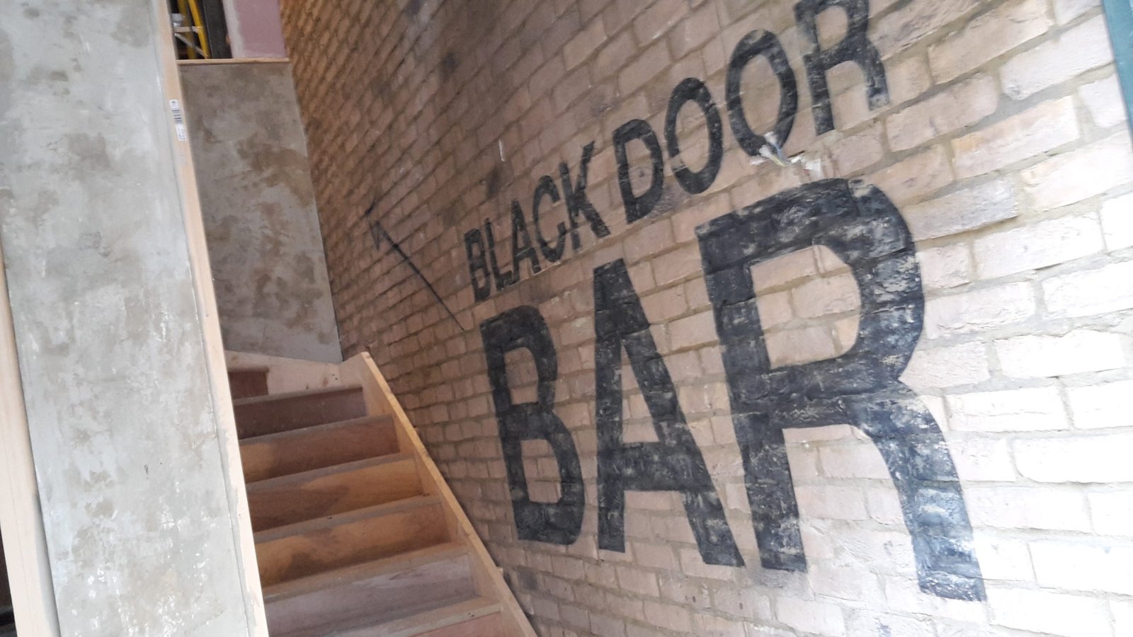 Hand painted signs by Harvey Woodward